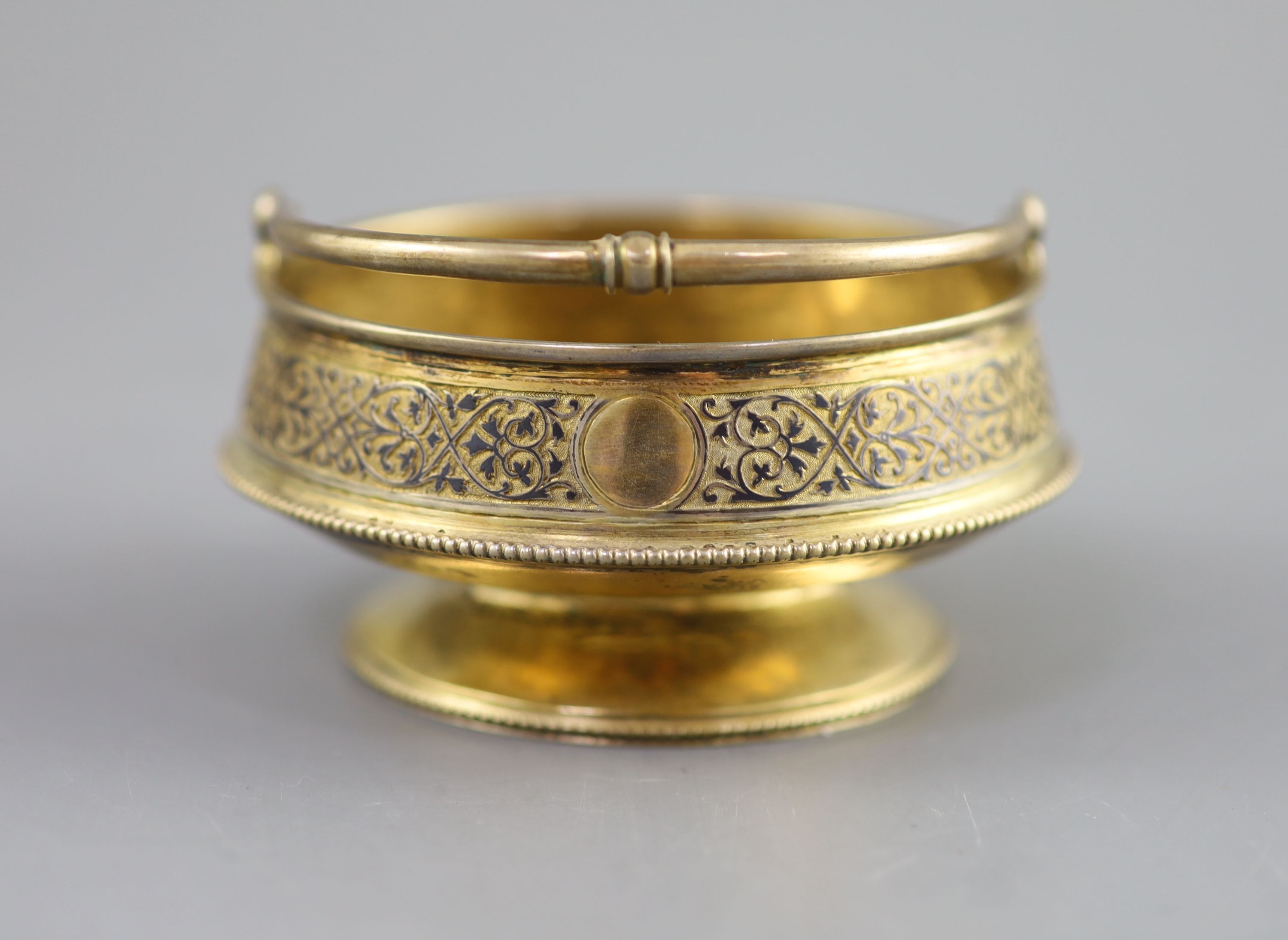 A late 19th century Russian 84 zolotnik silver gilt and niello bonbon basket